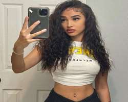 She has a piercing on her belly button.
